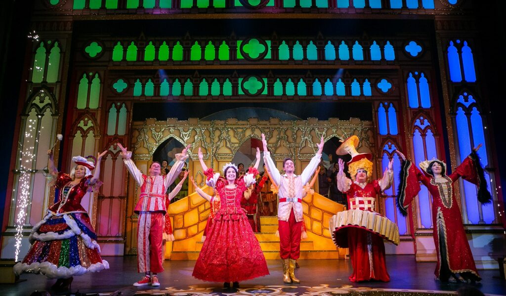 Performers taking a bow on stage